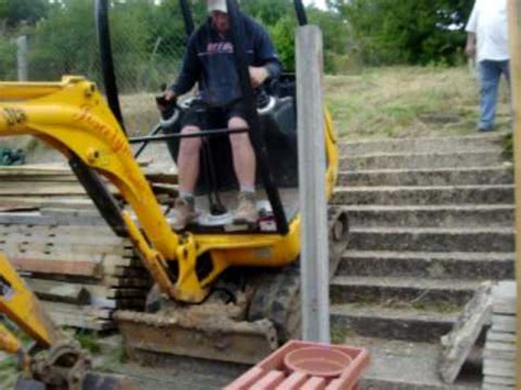 getting mini digger up steps|how to get mini digger.